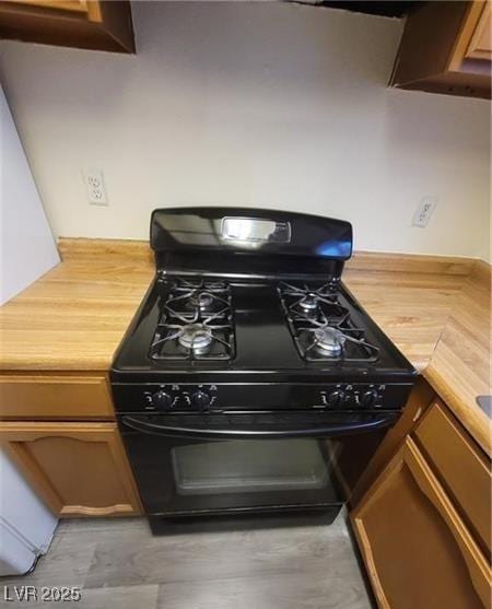 854 Stainglass Ln, Las Vegas, NV 89110 - kitchen view of black gas stove