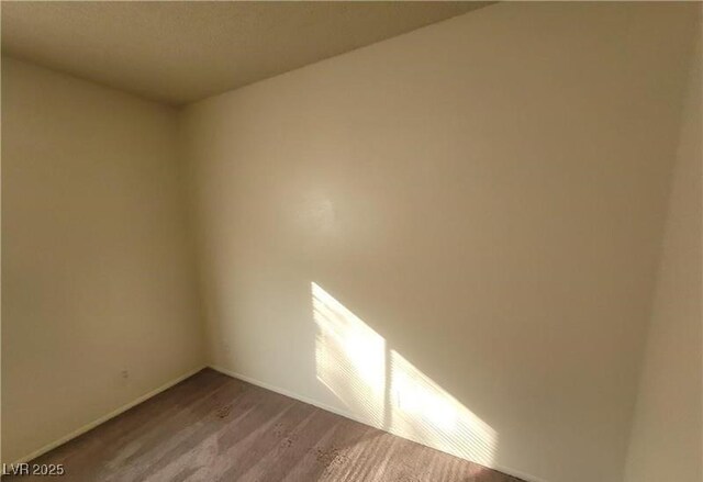 854 Stainglass Ln, Las Vegas, NV 89110 - spare room with baseboards and carpet flooring