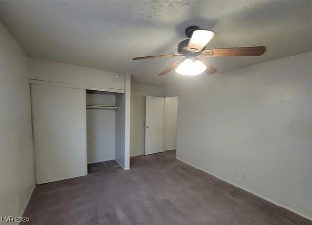 854 Stainglass Ln, Las Vegas, NV 89110 - unfurnished bedroom with a closet, a ceiling fan, and carpet flooring