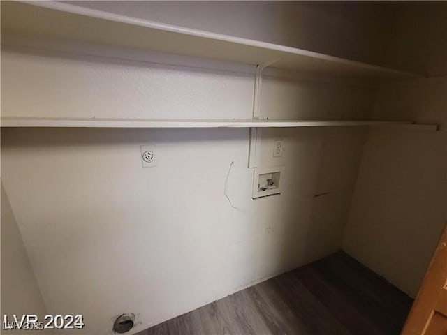 854 Stainglass Ln, Las Vegas, NV 89110 - washroom featuring hookup for a washing machine and dark wood-style flooring