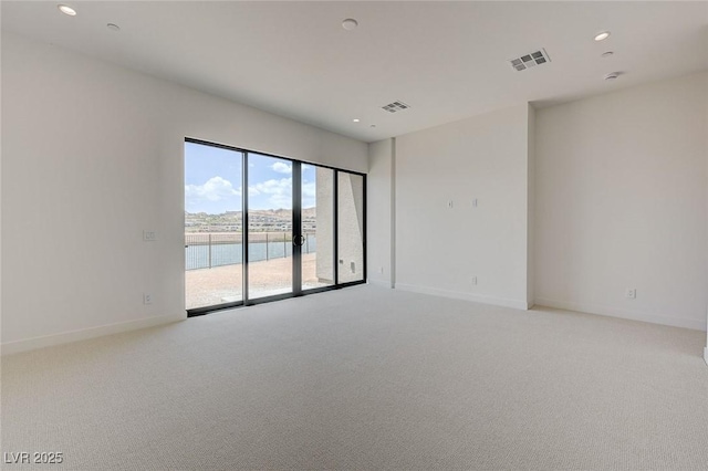 1600 Pleasant Bay Ct, Henderson, NV 89011 - empty room featuring light carpet, baseboards, and recessed lighting