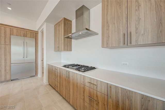 1600 Pleasant Bay Ct, Henderson, NV 89011 - kitchen featuring stainless steel appliances, wall chimney range hood, modern cabinets, and light countertops