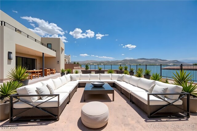 1600 Pleasant Bay Ct, Henderson, NV 89011 - view of patio featuring an outdoor living space and a water and mountain view