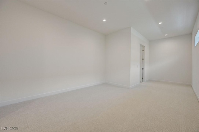 1600 Pleasant Bay Ct, Henderson, NV 89011 - empty room featuring light colored carpet, recessed lighting, and baseboards
