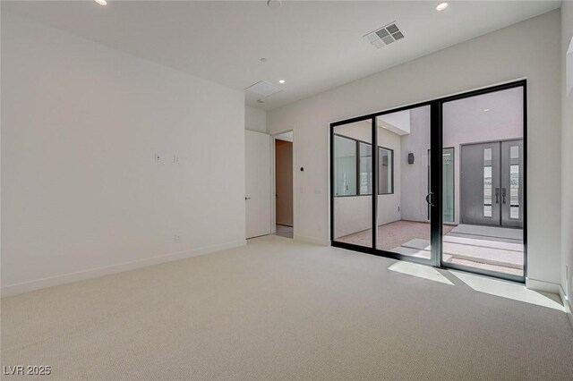1600 Pleasant Bay Ct, Henderson, NV 89011 - spare room featuring light colored carpet, recessed lighting, and baseboards