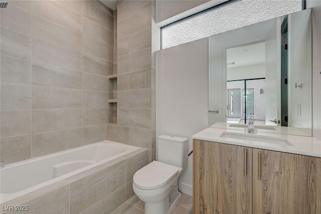 1600 Pleasant Bay Ct, Henderson, NV 89011 - full bathroom featuring vanity, toilet, tiled shower / bath combo, and tile patterned floors