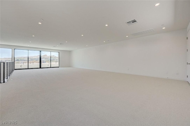 1600 Pleasant Bay Ct, Henderson, NV 89011 - spare room featuring light carpet and recessed lighting