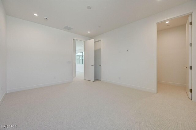 1600 Pleasant Bay Ct, Henderson, NV 89011 - empty room featuring recessed lighting, light carpet, baseboards, and a smoke detector