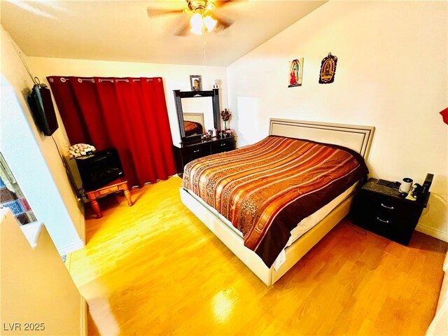1860 Banaba Ln, Las Vegas, NV 89156 - bedroom featuring wood finished floors and a ceiling fan