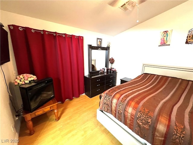 1860 Banaba Ln, Las Vegas, NV 89156 - bedroom featuring lofted ceiling and light wood-type flooring