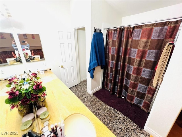 1860 Banaba Ln, Las Vegas, NV 89156 - bathroom with vanity, a shower with shower curtain, and baseboards