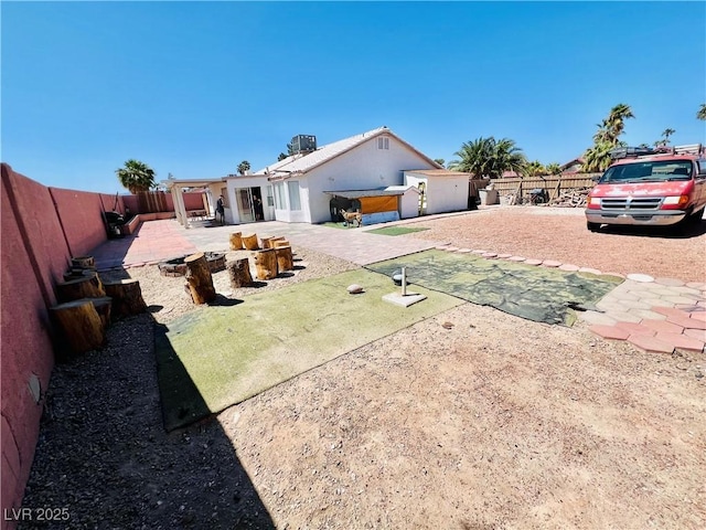 1860 Banaba Ln, Las Vegas, NV 89156 - fenced backyard featuring a patio