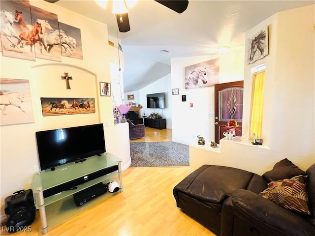 1860 Banaba Ln, Las Vegas, NV 89156 - living area featuring wood finished floors, lofted ceiling, and a ceiling fan