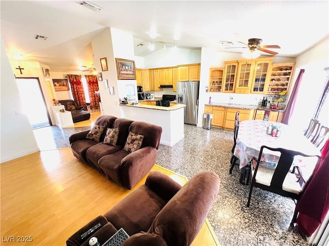 1860 Banaba Ln, Las Vegas, NV 89156 - living area featuring lofted ceiling, a ceiling fan, and baseboards