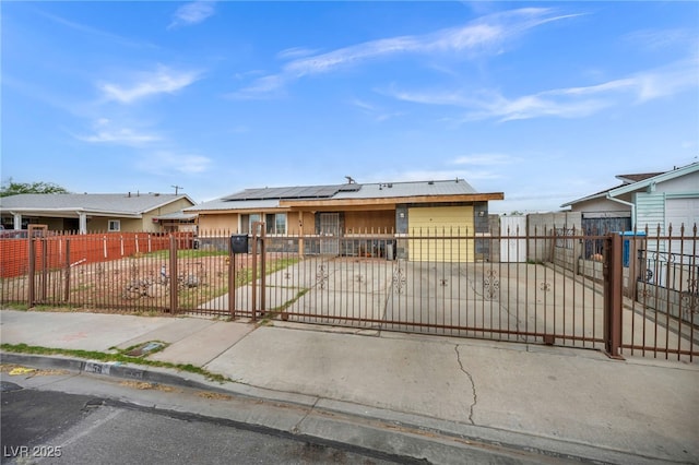 54 Del Amo Dr, Las Vegas, NV 89110 - ranch-style home featuring solar panels and a fenced front yard