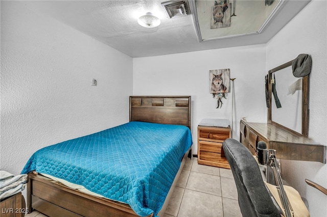 54 Del Amo Dr, Las Vegas, NV 89110 - bedroom featuring tile patterned floors and a textured wall