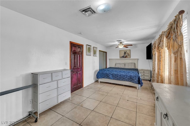 54 Del Amo Dr, Las Vegas, NV 89110 - bedroom with light tile patterned floors and a ceiling fan