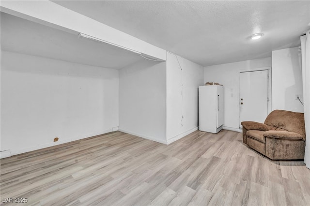 54 Del Amo Dr, Las Vegas, NV 89110 - sitting room featuring light wood-type flooring and baseboards
