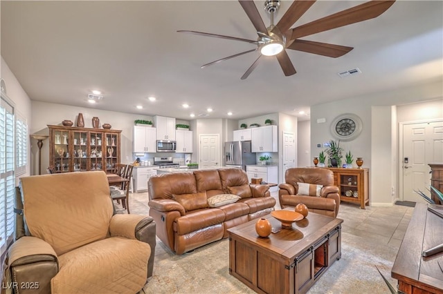 9229 Brayden Bay St, Las Vegas, NV 89178 - living room featuring a ceiling fan, recessed lighting, and baseboards