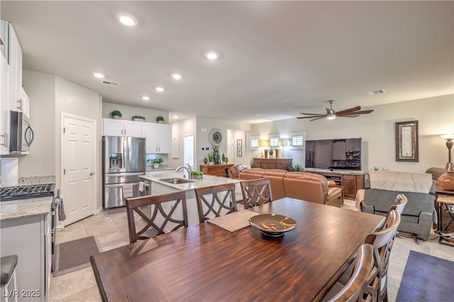 9229 Brayden Bay St, Las Vegas, NV 89178 - dining area featuring ceiling fan, recessed lighting, and light tile patterned floors