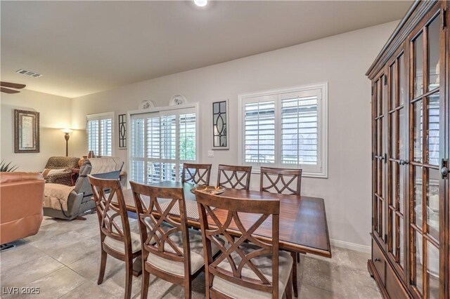 9229 Brayden Bay St, Las Vegas, NV 89178 - dining area with plenty of natural light and baseboards