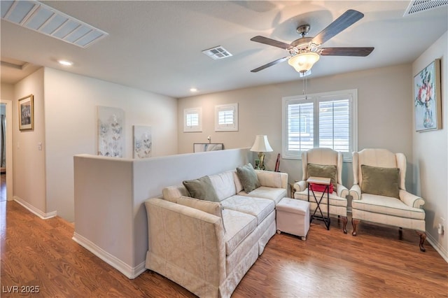 9229 Brayden Bay St, Las Vegas, NV 89178 - living room featuring ceiling fan, recessed lighting, wood finished floors, and baseboards