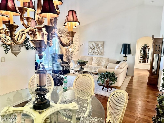 2820 Bluff Point Dr, Las Vegas, NV 89134 - living area featuring wood finished floors and high vaulted ceiling
