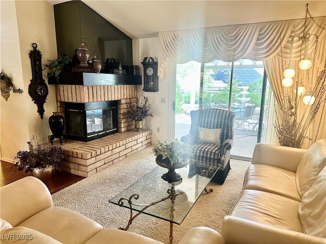 2820 Bluff Point Dr, Las Vegas, NV 89134 - living area featuring a fireplace and wood finished floors