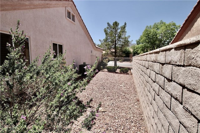 2820 Bluff Point Dr, Las Vegas, NV 89134 - view of side of home featuring stucco siding