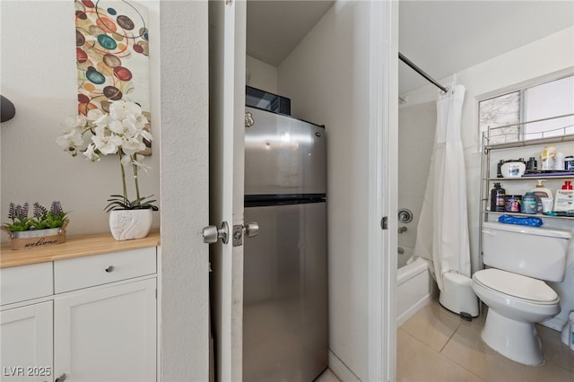 1916 Canosa Ave, Las Vegas, NV 89104 - full bathroom featuring toilet, shower / bath combo with shower curtain, and tile patterned floors