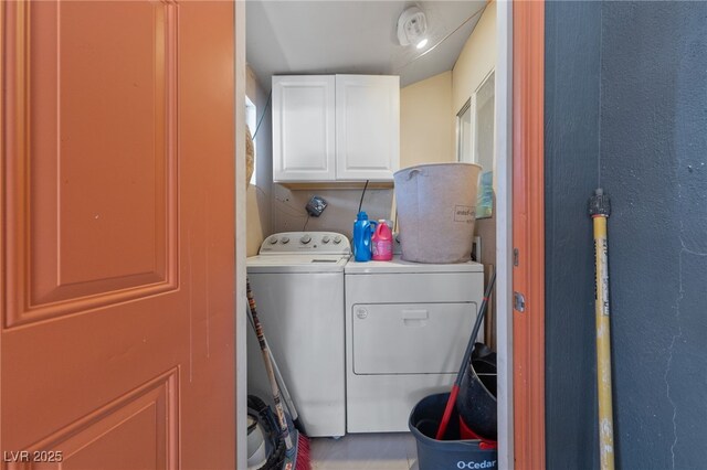 1916 Canosa Ave, Las Vegas, NV 89104 - laundry area with cabinet space and washer and dryer