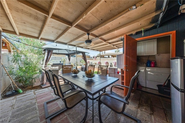 1916 Canosa Ave, Las Vegas, NV 89104 - sunroom with washing machine and clothes dryer