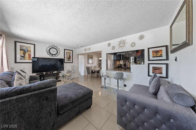 1916 Canosa Ave, Las Vegas, NV 89104 - living room with light tile patterned floors and a textured ceiling