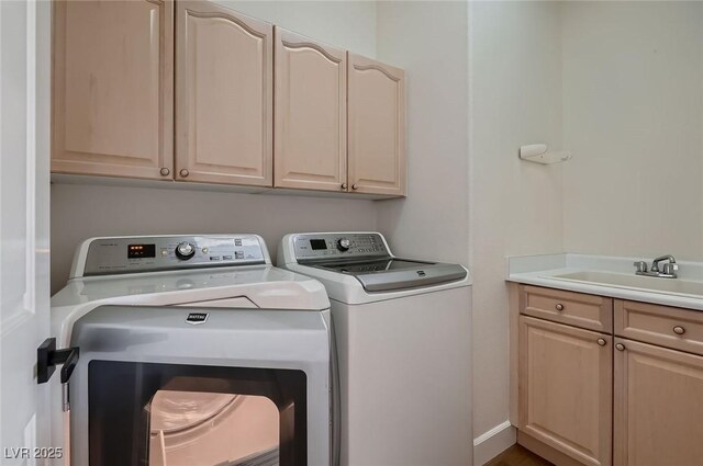 2448 Ram Crossing Way, Henderson, NV 89074 - washroom with washing machine and dryer and cabinet space