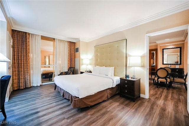 135 E Harmon Ave Unit 2420, Las Vegas, NV 89109 - bedroom featuring wood finished floors and crown molding