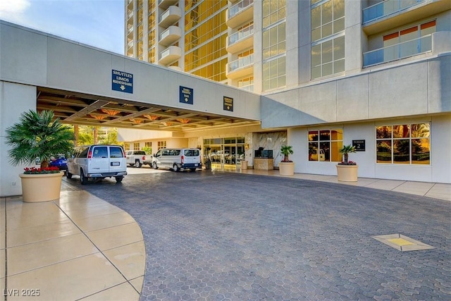 135 E Harmon Ave Unit 2420, Las Vegas, NV 89109 - view of property with covered parking
