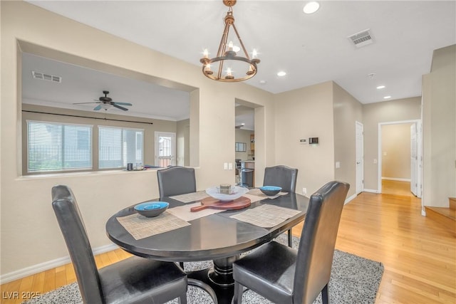 2529 Flodden St, Henderson, NV 89044 - dining space featuring light wood finished floors, baseboards, a chandelier, recessed lighting, and a ceiling fan