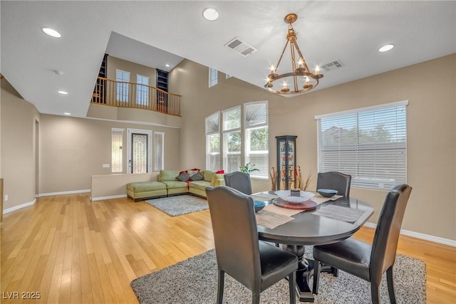 2529 Flodden St, Henderson, NV 89044 - dining room with light wood-type flooring, a chandelier, baseboards, and recessed lighting
