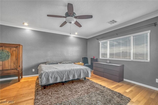 2529 Flodden St, Henderson, NV 89044 - bedroom with light wood-style floors, crown molding, ceiling fan, baseboards, and recessed lighting