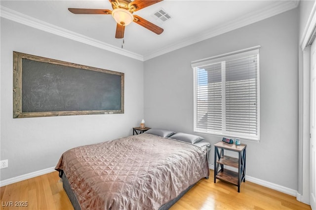 2529 Flodden St, Henderson, NV 89044 - bedroom with wood finished floors, ornamental molding, baseboards, and ceiling fan
