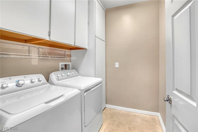 2529 Flodden St, Henderson, NV 89044 - laundry area featuring cabinet space, washing machine and dryer, baseboards, and light tile patterned flooring