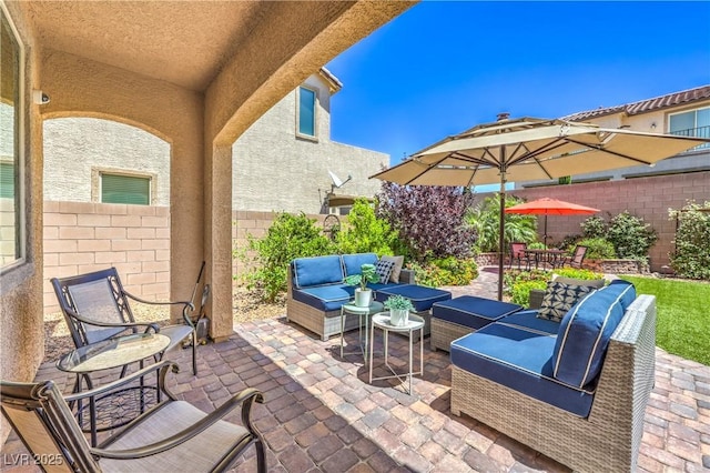 12286 Silvana St, Las Vegas, NV 89141 - fenced backyard with outdoor lounge area and a patio