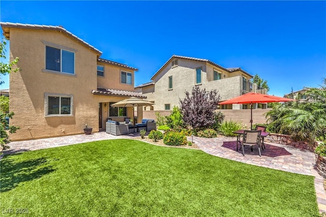 12286 Silvana St, Las Vegas, NV 89141 - back of property with an outdoor living space, a patio, stucco siding, and a tile roof
