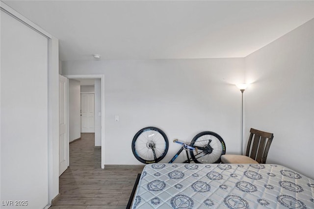 603 Palmhurst Dr, Las Vegas, NV 89145 - bedroom featuring wood finished floors and baseboards