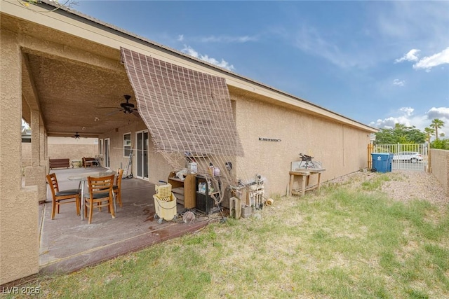 603 Palmhurst Dr, Las Vegas, NV 89145 - rear view of property with stucco siding, ceiling fan, and a patio