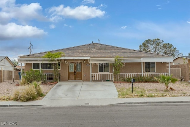 603 Palmhurst Dr, Las Vegas, NV 89145 - view of front of property with stucco siding and a porch