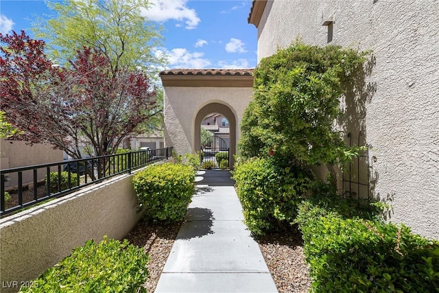 820 Colina Alta Pl, Las Vegas, NV 89138 - view of exterior entry with stucco siding and a tiled roof
