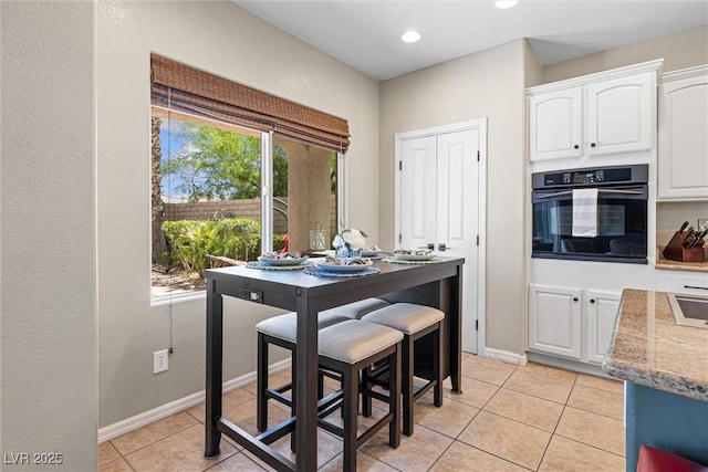 820 Colina Alta Pl, Las Vegas, NV 89138 - dining room with light tile patterned floors, recessed lighting, and baseboards