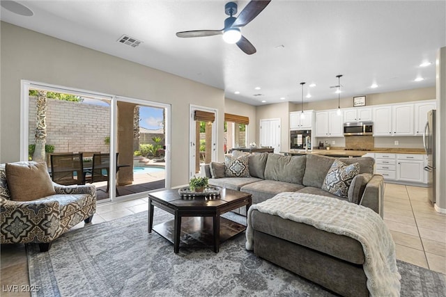 820 Colina Alta Pl, Las Vegas, NV 89138 - living room with light tile patterned flooring, a ceiling fan, and recessed lighting