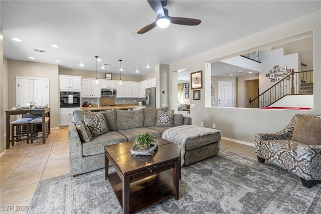820 Colina Alta Pl, Las Vegas, NV 89138 - living room with light tile patterned floors, ceiling fan, stairway, baseboards, and recessed lighting